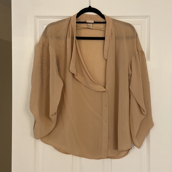 Oversized H&M tan blouse with asymmetric design - Picture 2 of 3